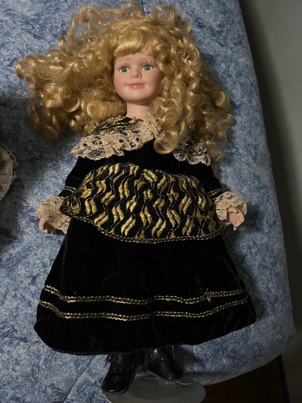 Porcelain Doll in Black and Gold Dress - Classic Collectible
